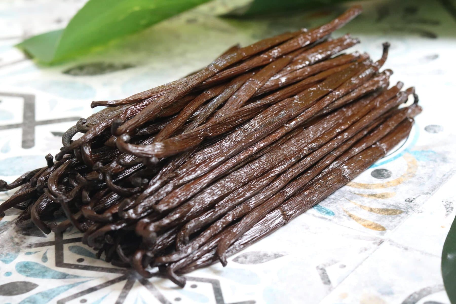 A hand-tied bundle of Grade A Madagascan vanilla pods, glossy and pliable